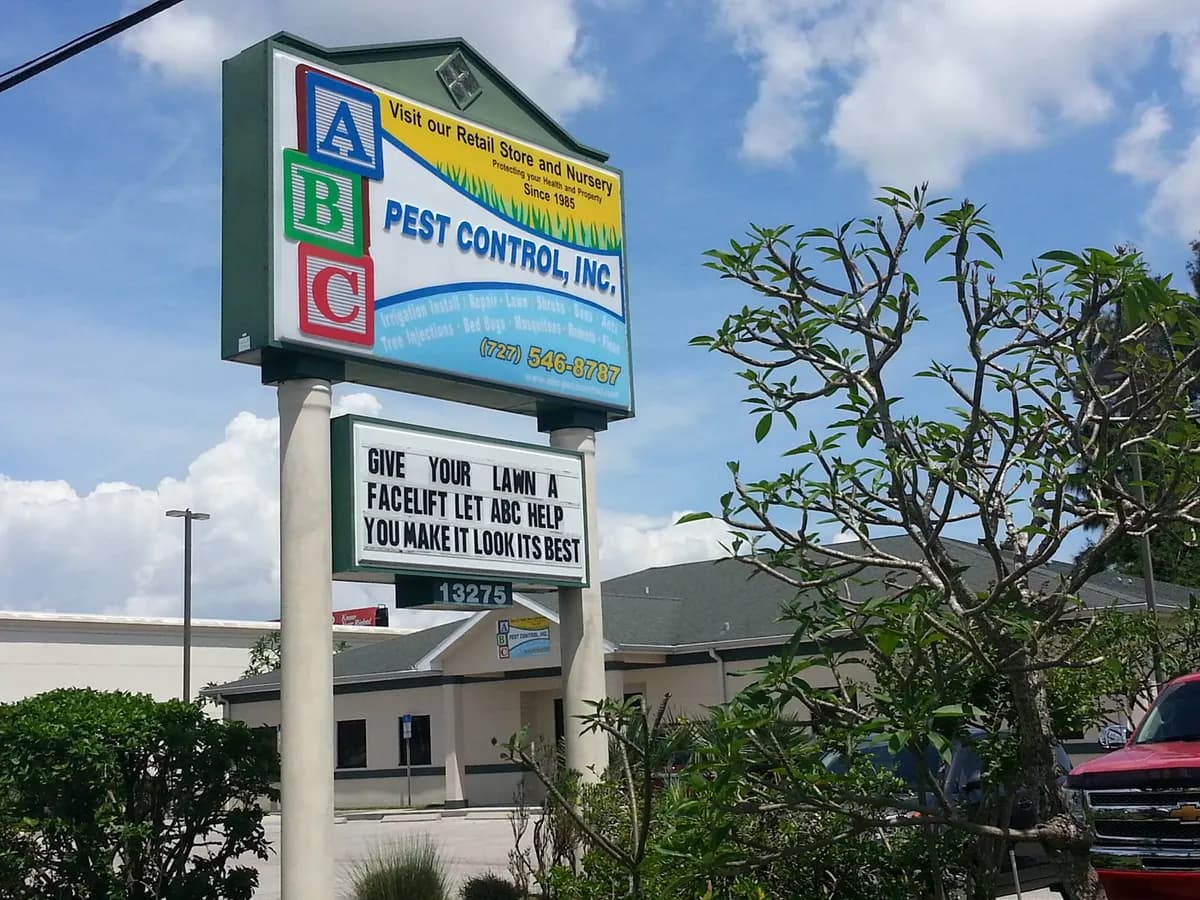 ABC Pest Control building sign with Visit our Retail Store and Nursery text